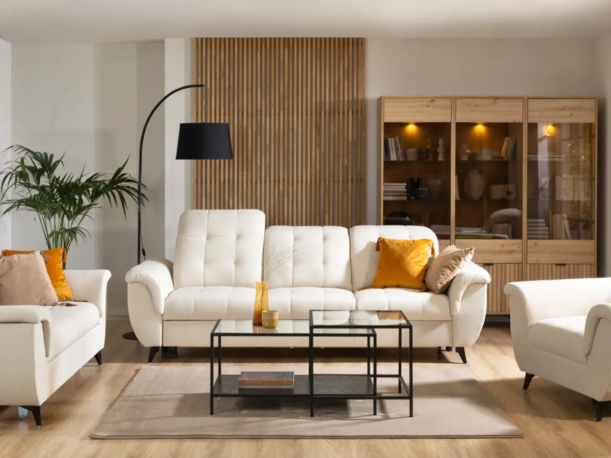 Sofá de tres plazas Doria convertible de terciopelo crema